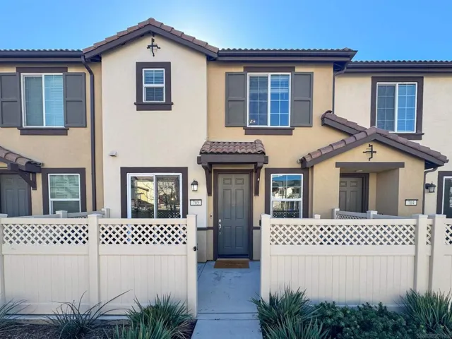 Front includes private fenced front patio area.
