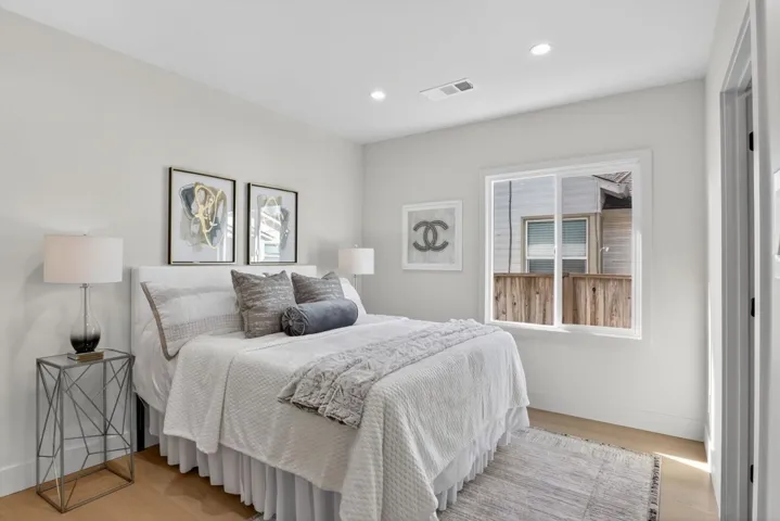 Bedroom featuring light wood-style flooring and recessed lighting