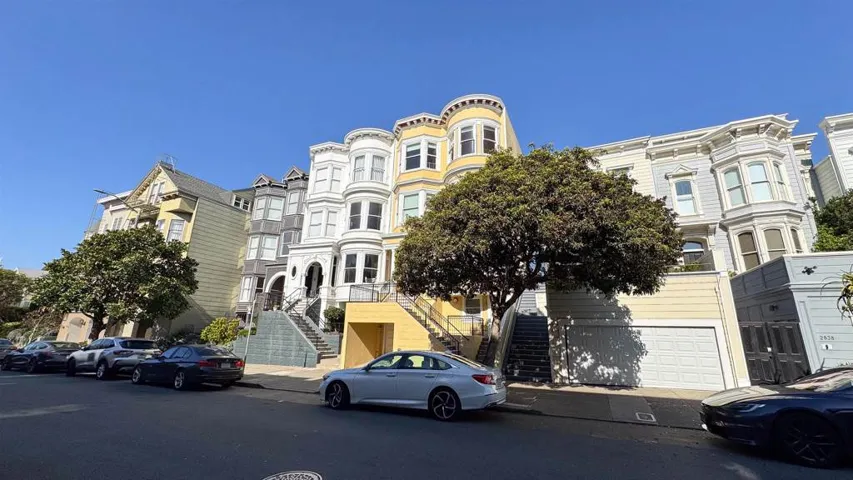 View of front of home featuring stairs