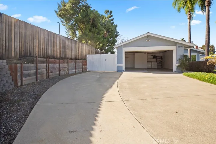 Front of garage with left side gate closed