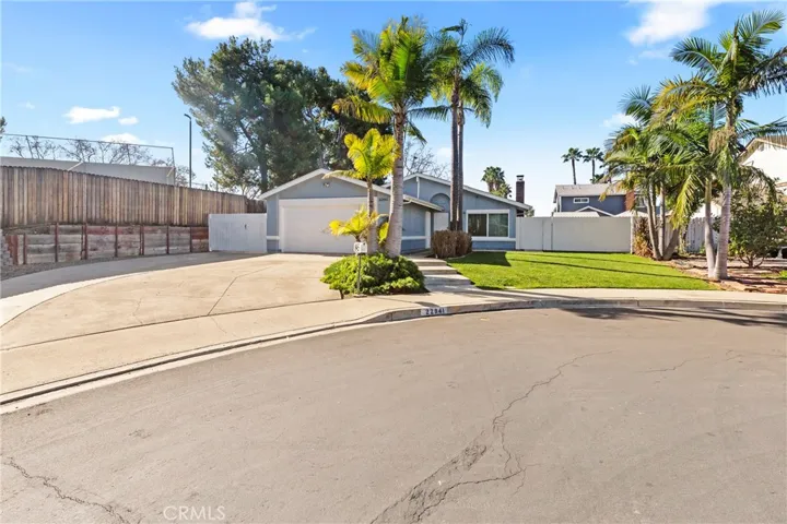 Front view of property with both gates closed