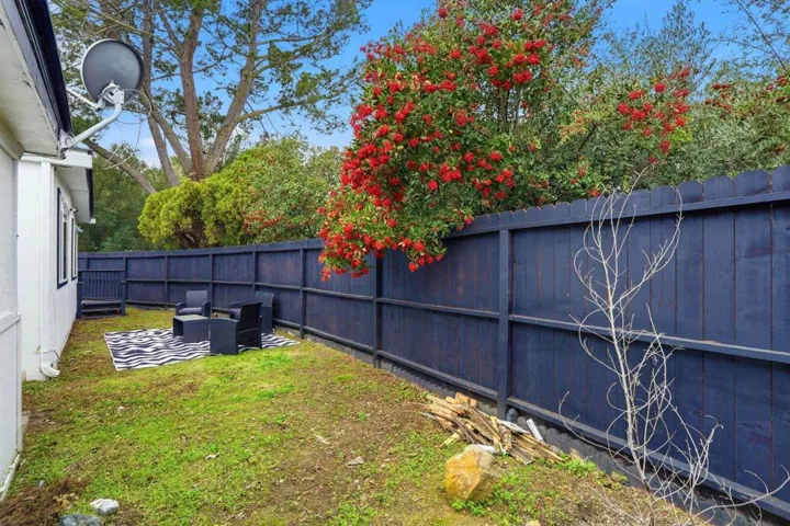 View of fenced backyard