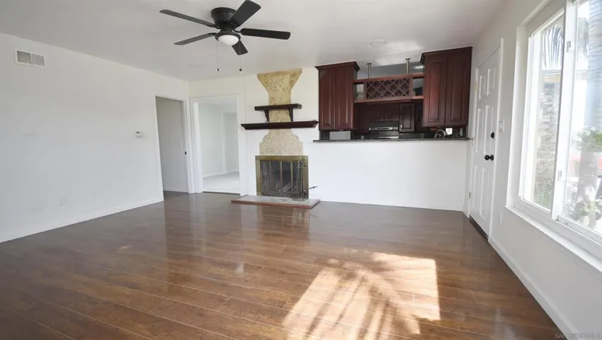 KITCHEN OPENS UP TO LIVING ROOM AND DINING ROOM