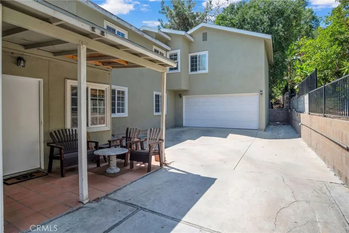 Side Patio Leading to Laundry Area