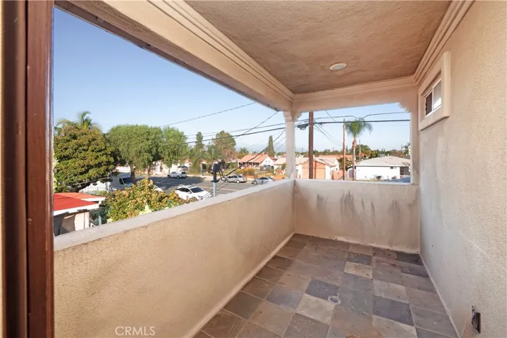 Balcony over looking the neighborhood off primary bedroom.