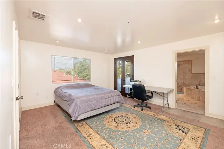 Master bedroom with balcony.