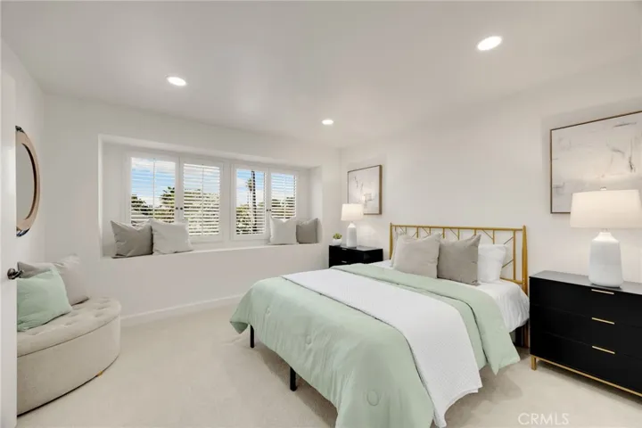 Primary bedroom with window seat