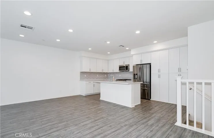 Open living room to kitchen