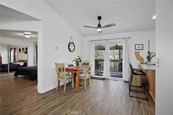Dining area has sliding door to back deck for effortless outdoor enjoyment.