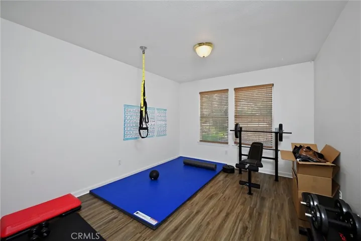 Bedroom 2 is set up as a workout room.