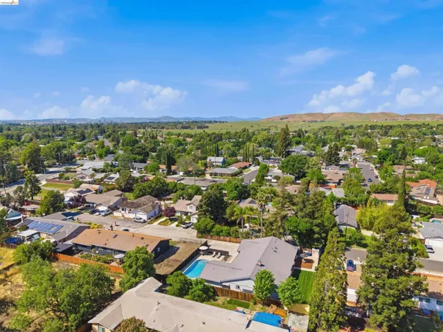 Aerial view of residential area with mountains