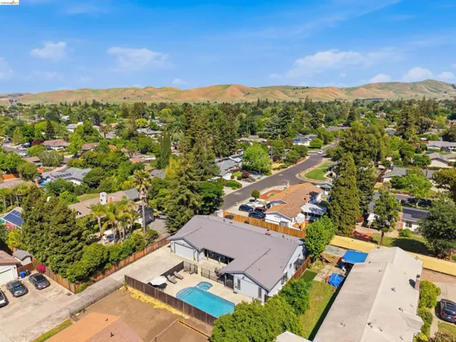 Aerial view of residential area with mountains