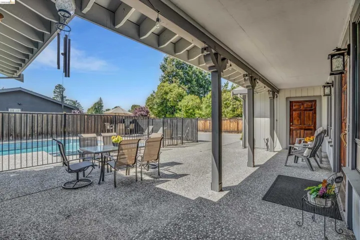 View of patio with outdoor dining area