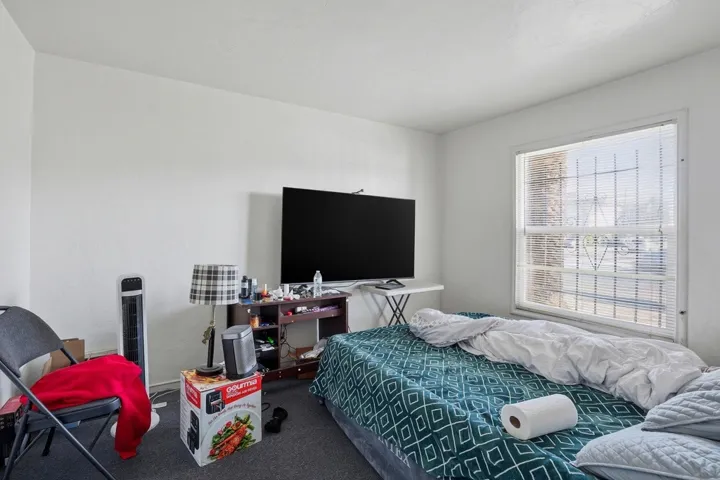 Bedroom featuring carpet flooring