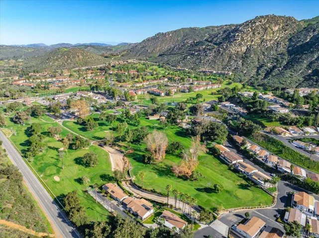 Wide aerial view of the Lawrence Welk golf course highlighting lush greens and open vistas.