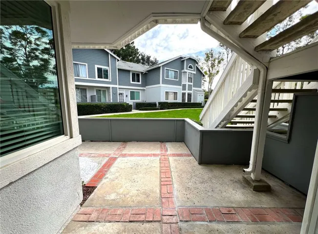 Sliding door in primary bedroom leads out to the patio