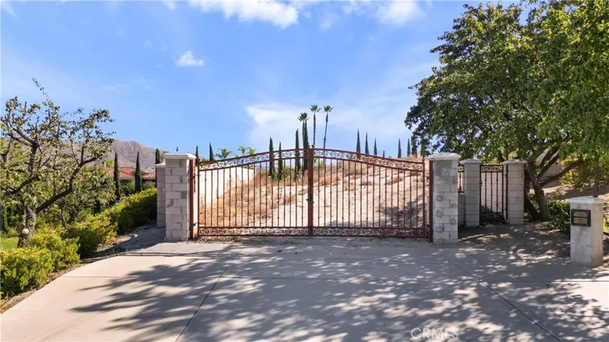 Private gate with walled perimeter