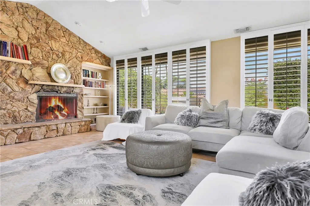 Living Room with fireplace and built in bookcase