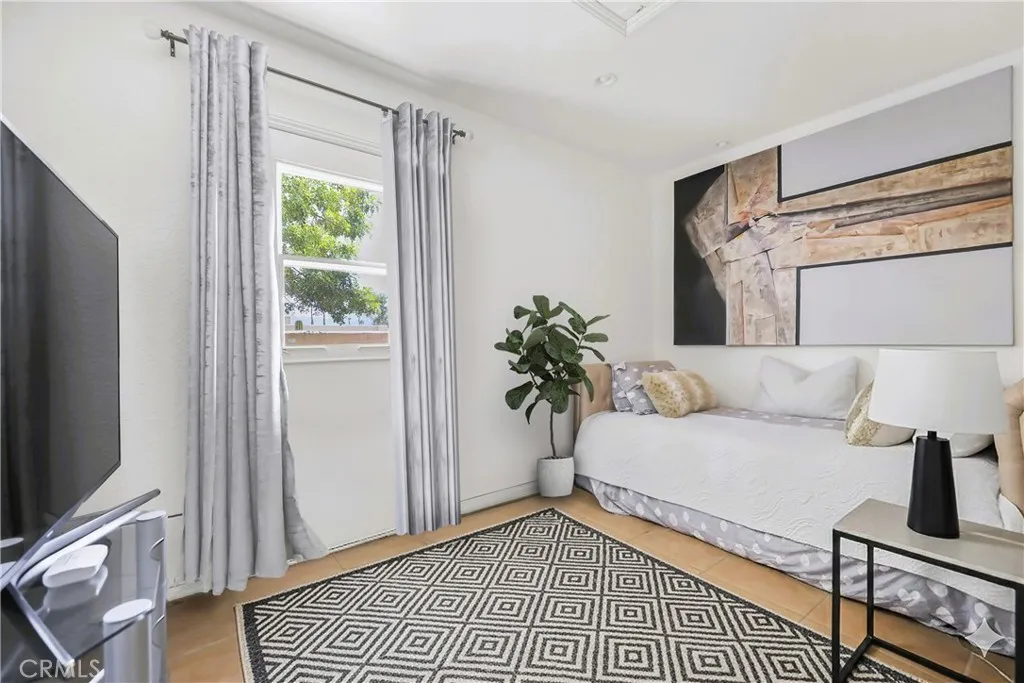 Room with private entrance off of side patio.