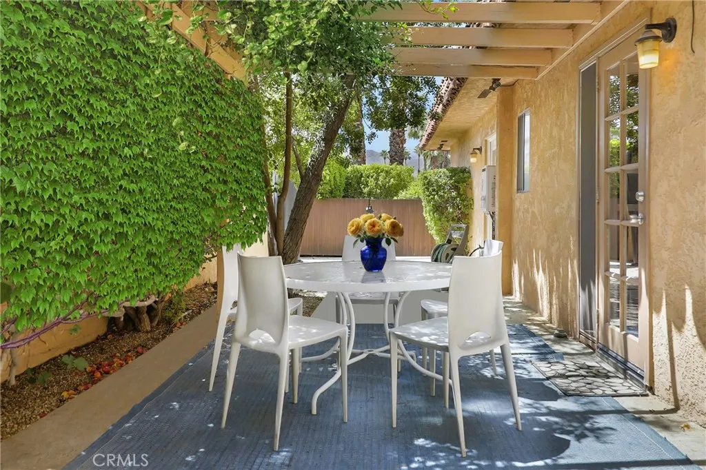 Private patio, perfect for computer time or relaxing with a book in this lush retreat!