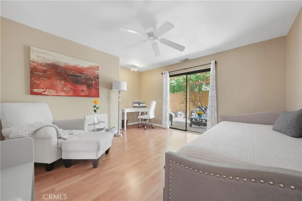Room with sliding door to private patio