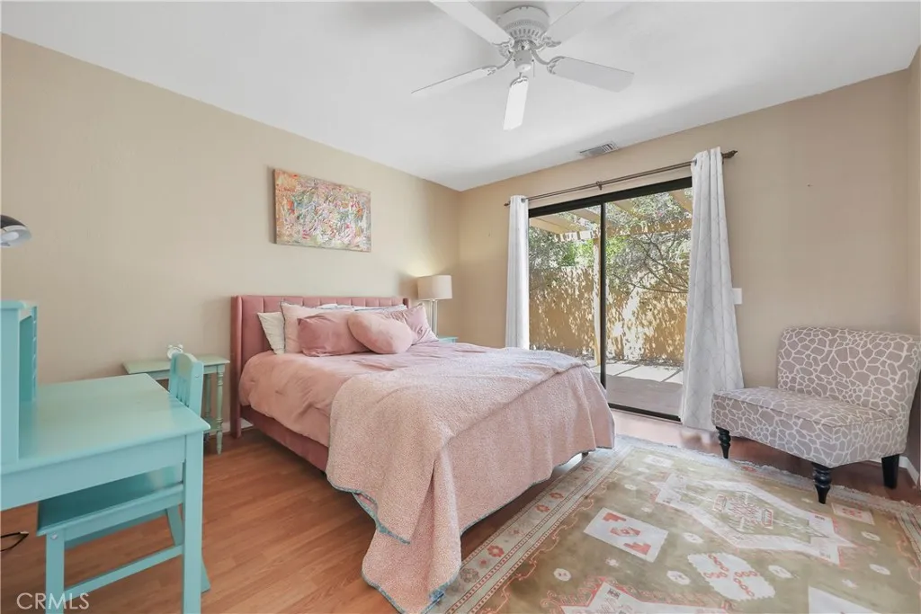 Bedroom with slider door to patio