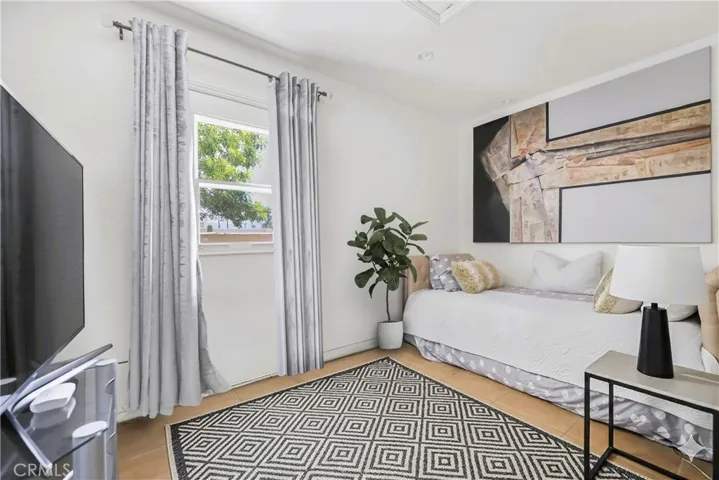 Room with private entrance off of side patio.