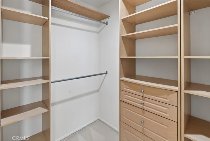 1 of 2 Custom closets in primary