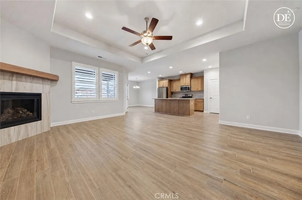 AI Modified Picture of Kitchen and Living Room