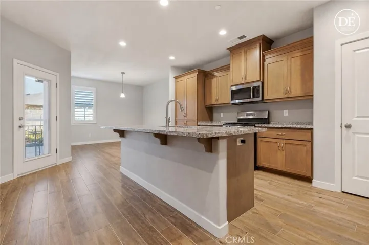 AI Modified Picture of Kitchen and Dining Room
