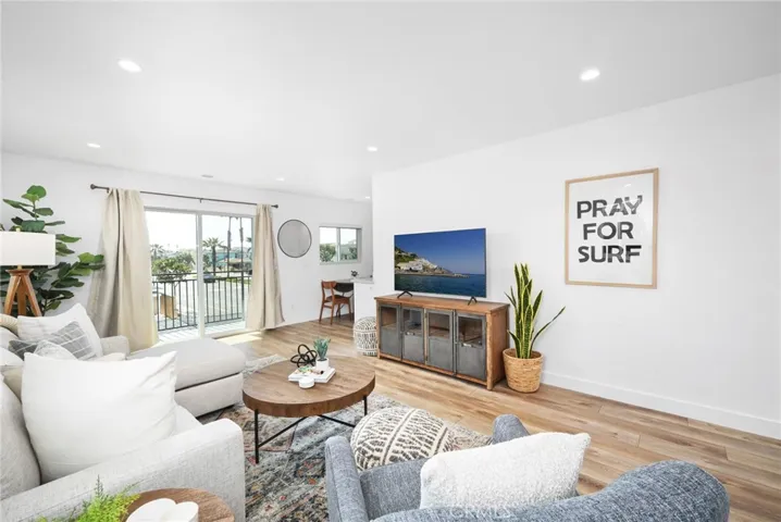 Upper Unit Living Room w/ Balcony