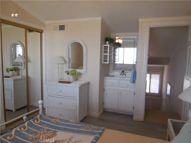 3 bedroom with closet and sink.