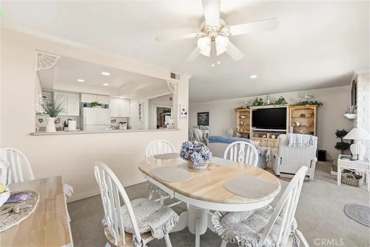 Dining area looking into kitchen and livingroom