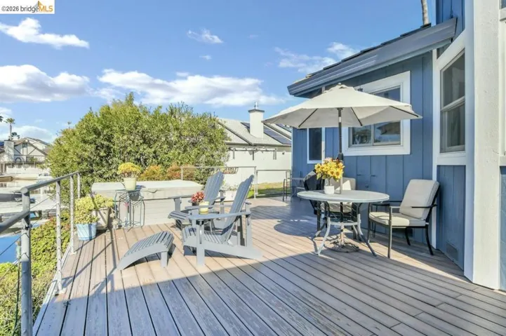 Wooden deck featuring outdoor dining​​‌​​​​‌​​‌‌​​‌​​​‌‌​​​‌​​‌‌​​‌‌​​‌‌​​​​ area