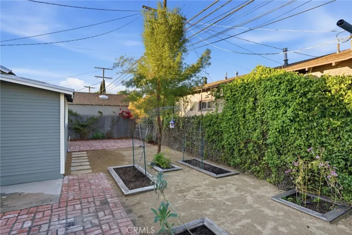 Back house has it's own private patio area as well!