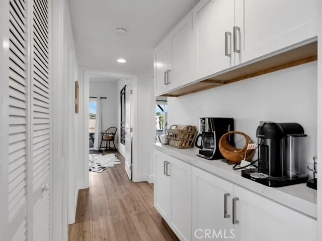 Hallway laundry, storge and coffee bar