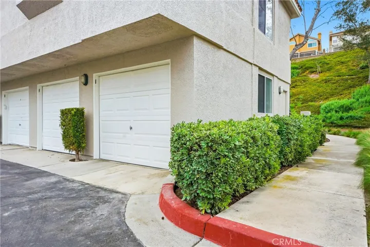 Secure one car garage with window and side door access