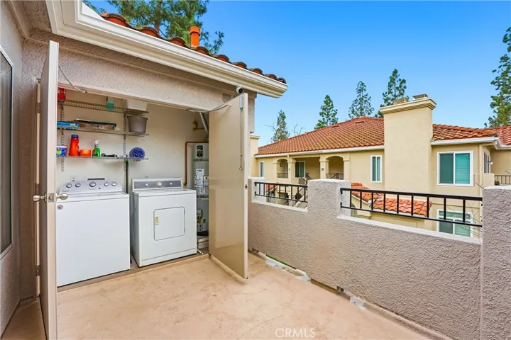 Patio access to enclosed washer and dryer