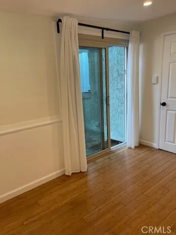 Door to back yard from back bedroom.