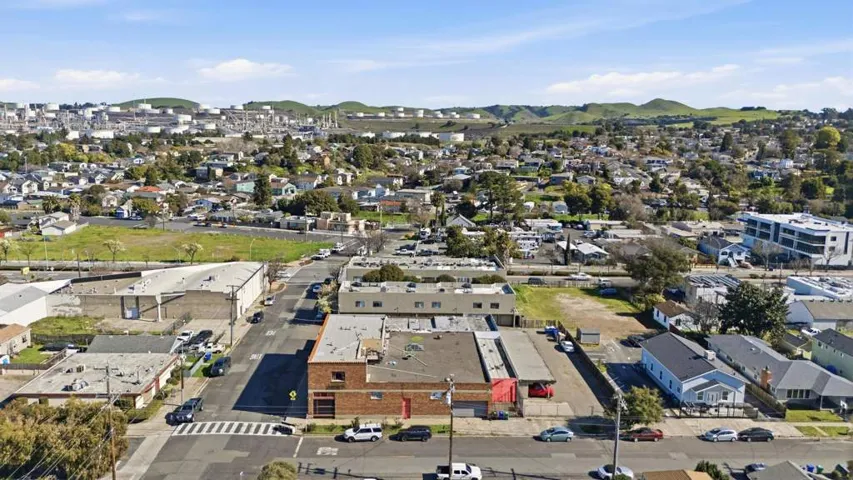View of property location with nearby suburban area
