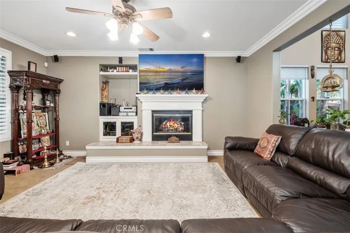 Family room, opens to kitchen and the formal living room.
