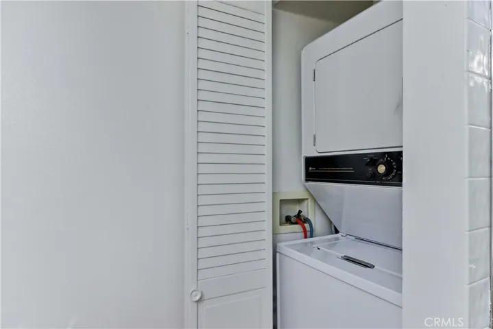 Washer/dryer added in bathroom closet.