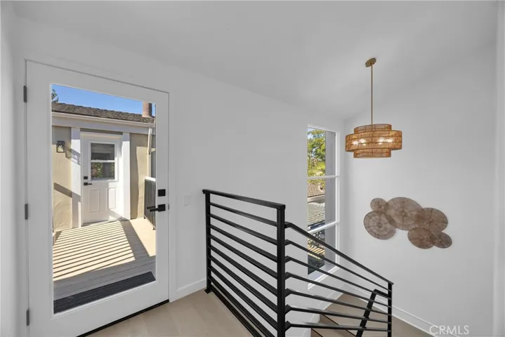 2nd floor looking toward separate quarters (or 4th bedroom, with kltchen & bath)