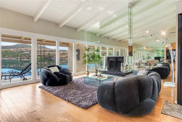 Family room with fireplace and vaulted ceilings