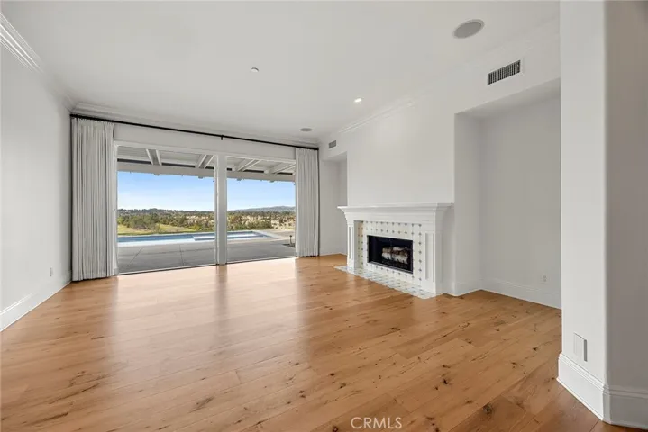 Living Room is Open and Spacious with Fireplace