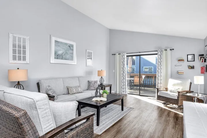 Living Room with access to deck and lake views