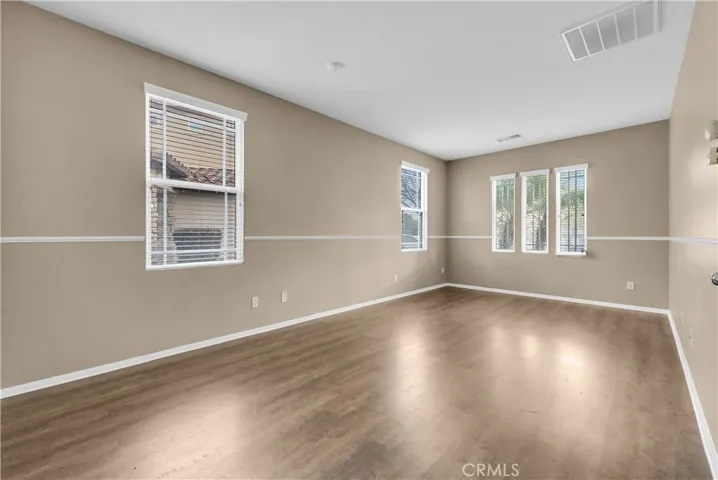 Bonus Room / Entertainment Room with separate doors.