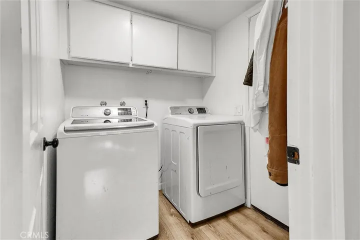 SEPARATE LAUNDRY ROOM OFF FAMILY ROOM WITH LOTS OF STORAGE
