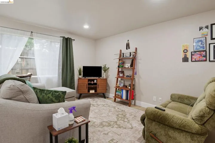 Living room featuring recessed lighting and wood finished floors
