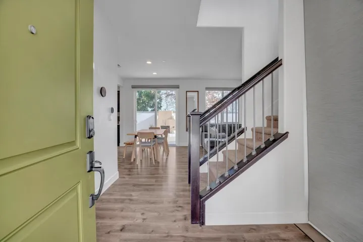 Entryway featuring light wood-style flooring and recessed lighting